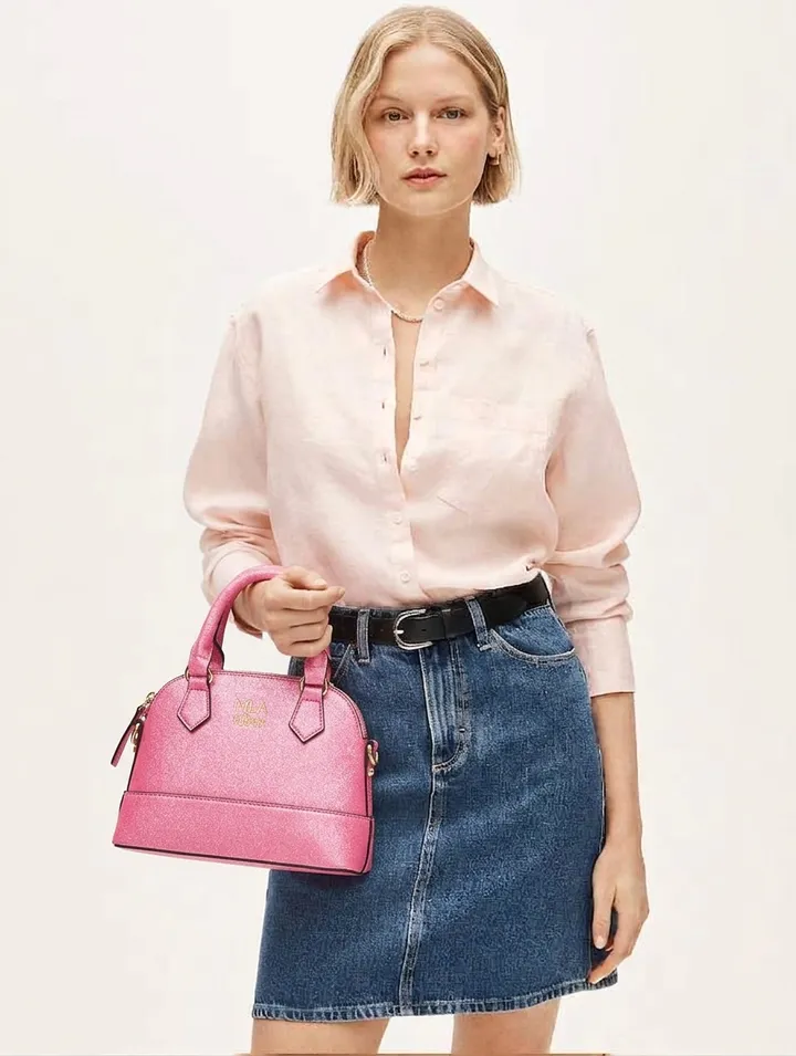 Real on-site AI try-on: a handbag rendered onto the shopper's own photo from a flat product image — the accessory category Google's Try It On does not cover.